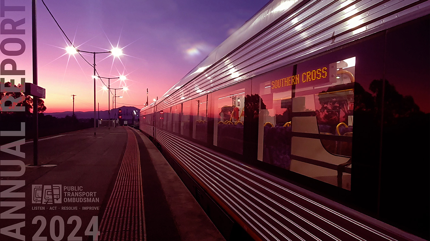 PTO AnnualReport cover shows a V/Line train parked at the Ararat train station. It is sunrise and there is a mountain in the background.